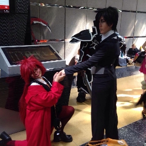 Mya at ACen 2015, cosplaying as Grell Sutcliff from Black Butler, proposing to Claude Faustus from Black Butler